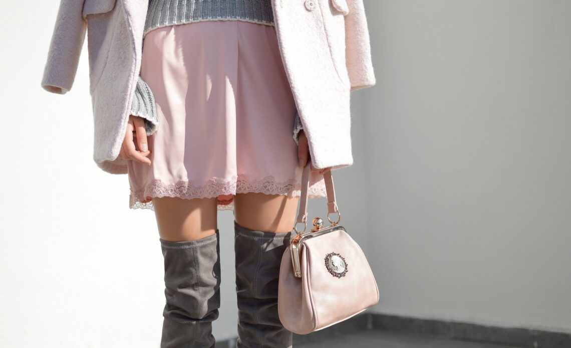 A woman wearing a stylish wool skirt, perfect for any occasion